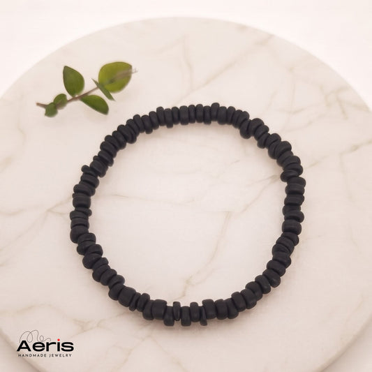 Bratara handmade elastica cu margele din cocos de forma neregulata