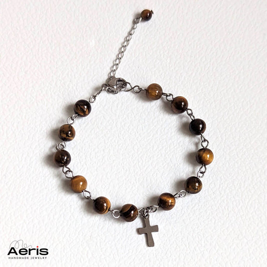 Bratara cu margele ochi de tigru si charm cruciulita