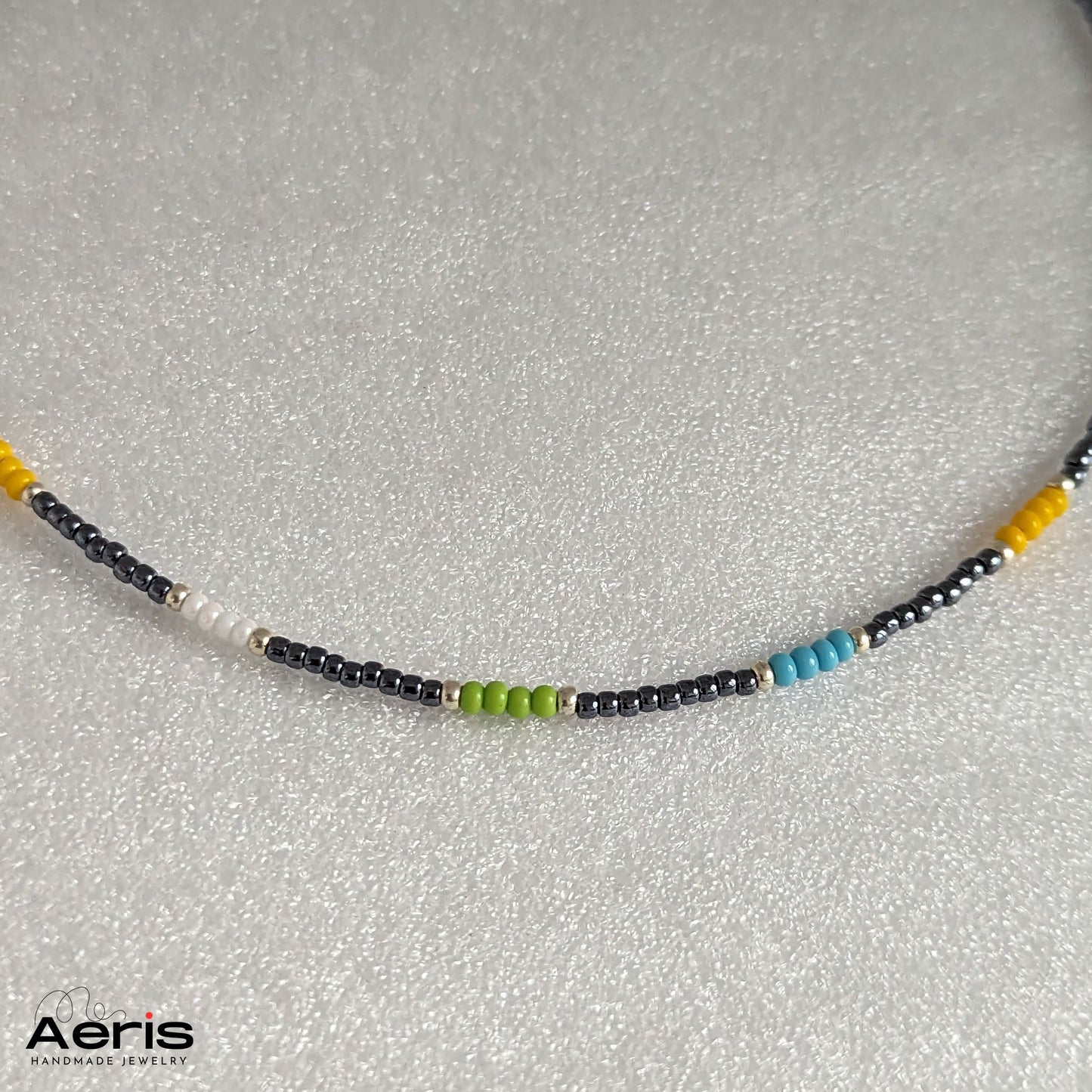 Colier la baza gatului, detaliu