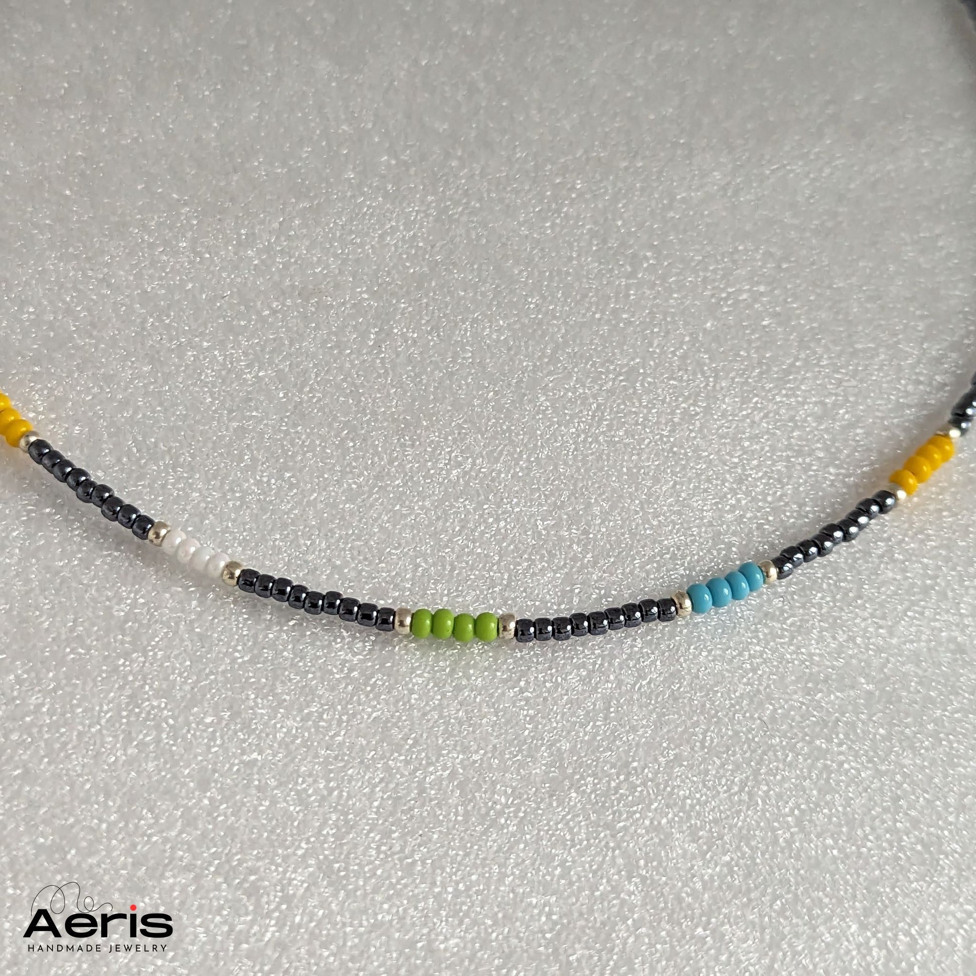 Colier la baza gatului, detaliu