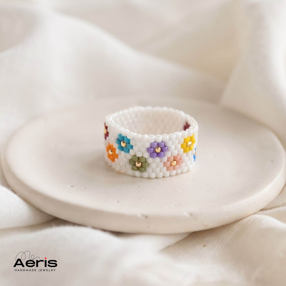 Inel handmade cu flori multicolore